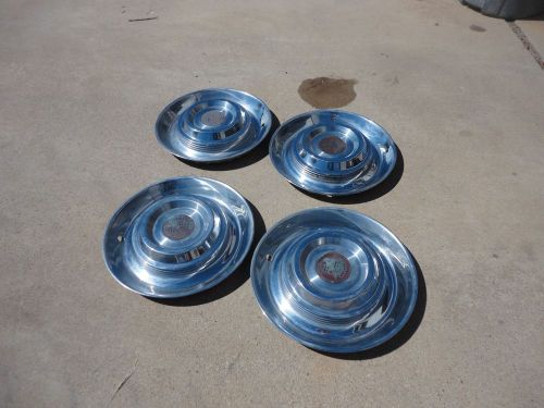 Cadillac 1955- set of 4 vintage used hub caps- 15&#034;- original-driver quality