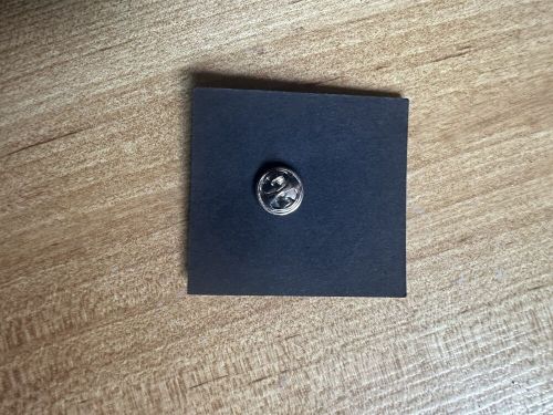 Aston martin rapide lapel official pin badge on backing card