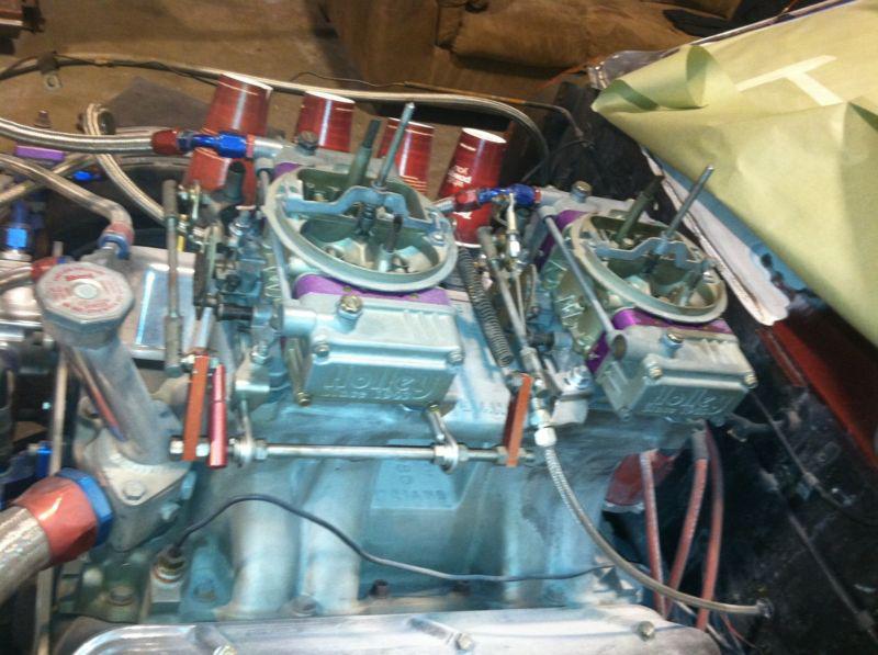 Bigblock chevy weiand tunell ram rectangle port two 660 center squirt carbs