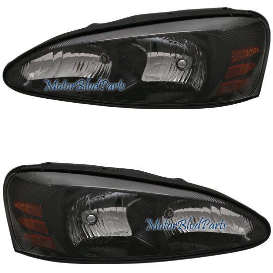 04-08 grand prix headlights headlamps passenger+driver