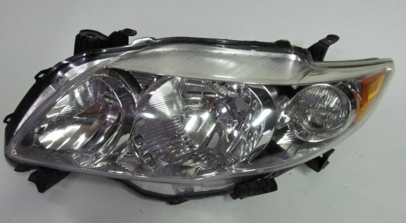 09 2010 toyota corolla left headlight nice!