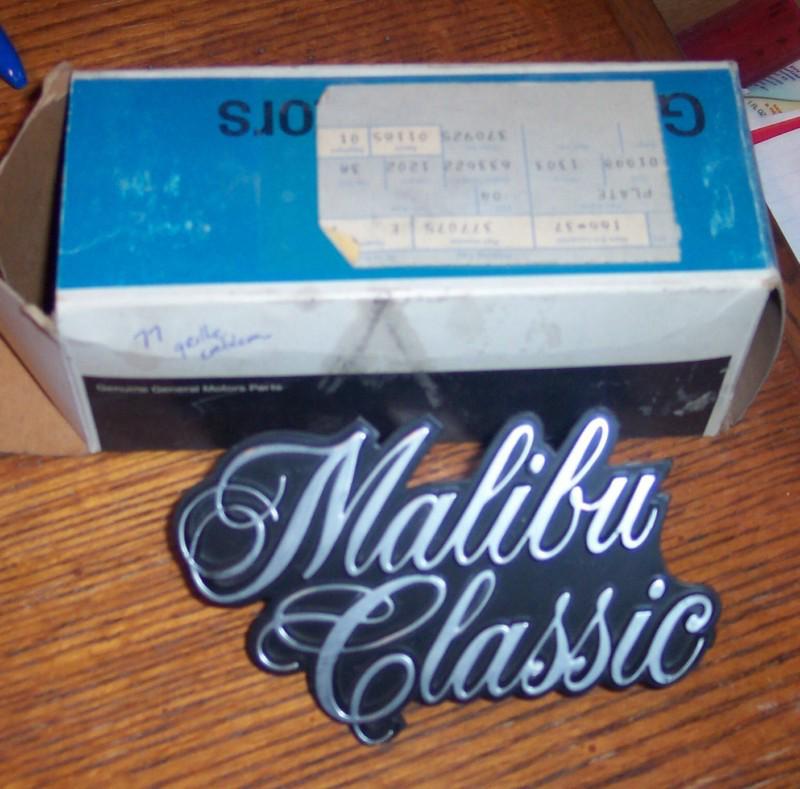 Nos 1977 chevy malibu classic grille emblem