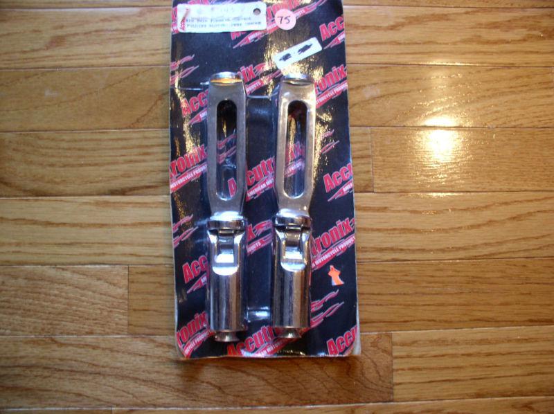 Accutronix chrome folding slotted foot pegs