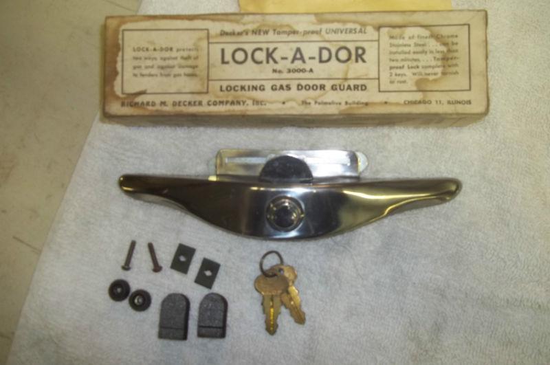 Locking gas door guard, decker's lock-a-door   (fits, list in description) nos