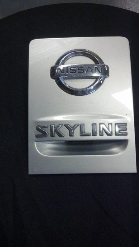 Nissan skyline trunk lid finish plate