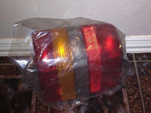 93-98 jeep grand cherokee rh tail light oem new