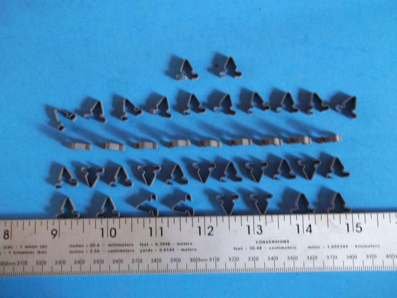 Early models all gm & packard door bottom weatherstrip fastener