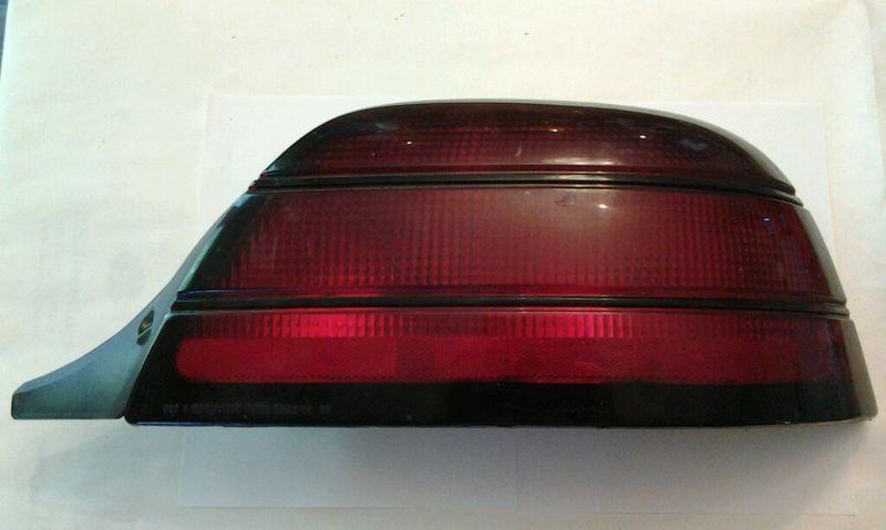 92 93 94 95 grand am l. tail light gt 13938