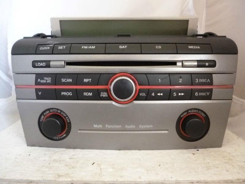 06-09 mazda 3 factory am fm radio cd player ban8669r0 silver *