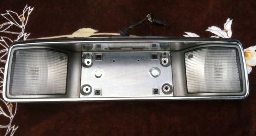 94 95 96 97 98 99 cadillac deville license lamp opening, reverse, 16518167