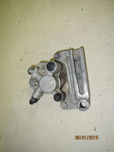 1997 kawasaki kx100 oem rear brake caliper and mount