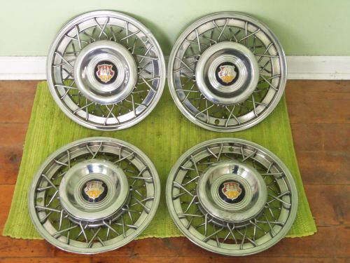 53 54 55 oldsmobile accessory wire spoke hubcaps set 4 olds 1953 1954 1955