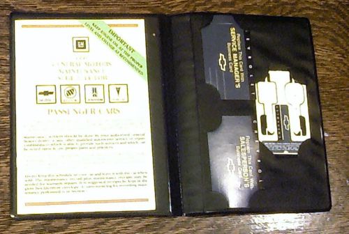 1991 gm (chevrolet) maintenance sched, leatherette booklet, w/ wallet key blank