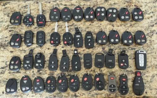 Lot of 44 keyfobs keyless rekotes for different brands oem