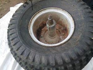 Old three wheeler front rim, at 22 x 11 - 8