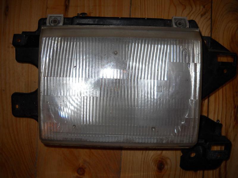 Headlight rh ford bronco f150 f250 f350 87 88 89 90