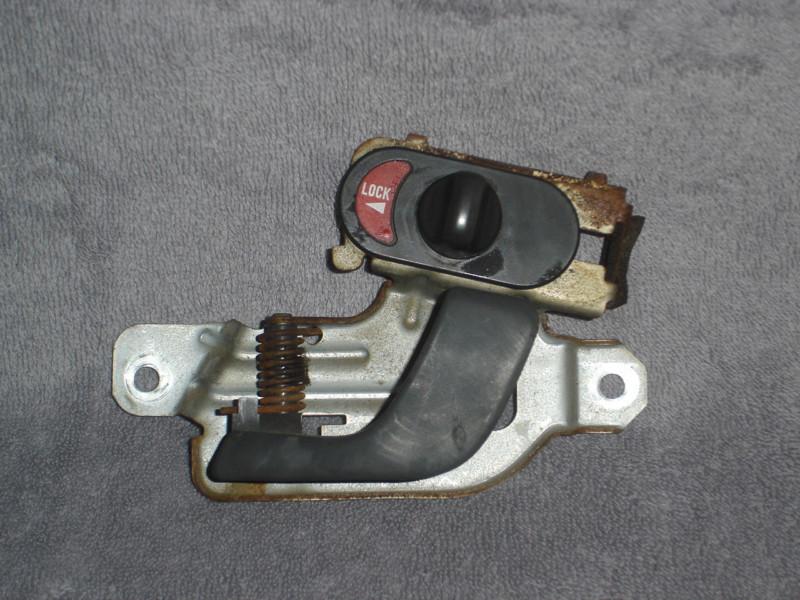 90 dodge colt interior door handle with lock mechanism driver side 