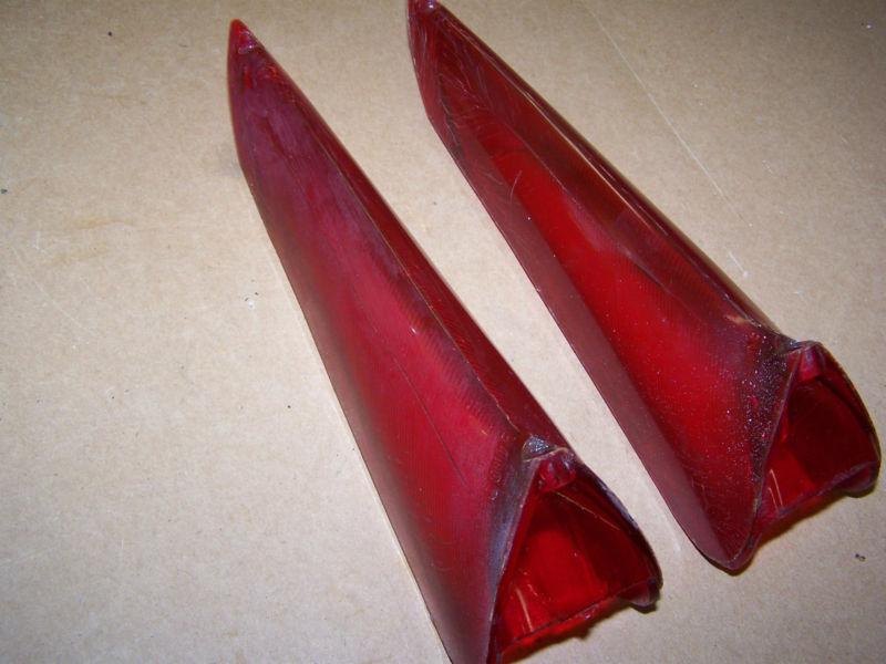 Pair of original 1961 cadillac tail light lenses