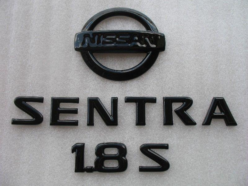 04 05 2006 nissan sentra 1.8 s black blackout blacked out emblem logo badge sign