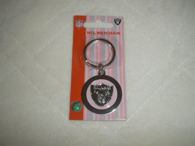 Nfl-raiders keychain -silver metal with pink- nice! t1222