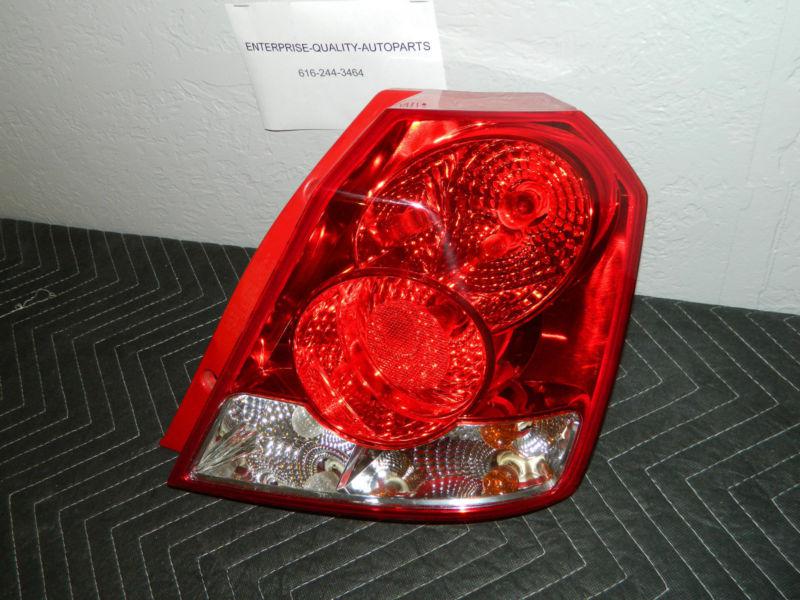 Oem 2004-2008 chevrolet aveo hatchback right, passenger side tail light assembly