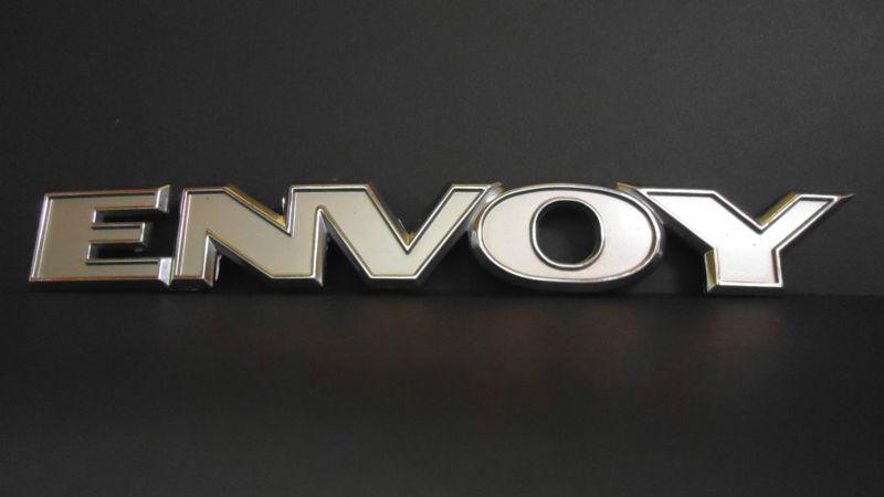 Used genuine gm "envoy" nameplate fits rear hatch 2003-2005  #15123967 1512-3967