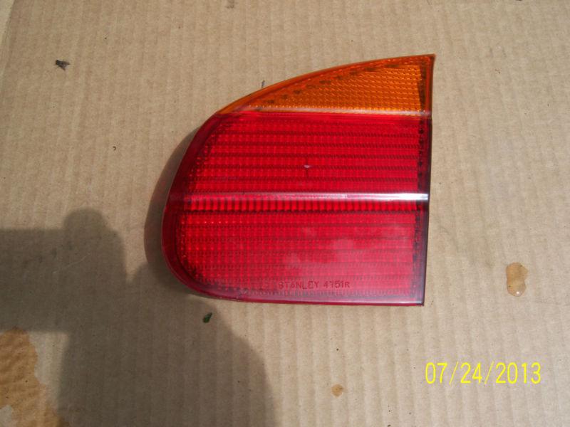 2000 chevy prizm right side trunk tail light reflector