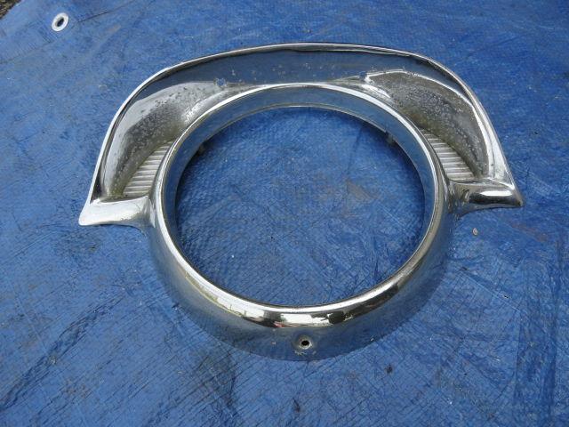 1956 cadillac original  headlight bezel.