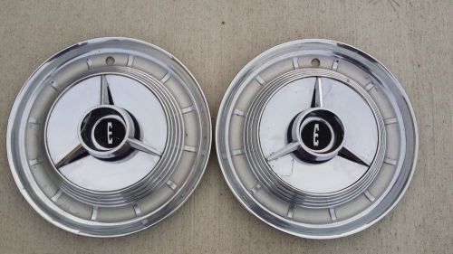 Beautiful pair of edsel spinner hubcaps wheelcovers