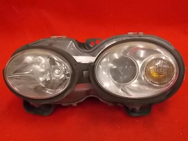 Jaguar x type head light assembly drivers  side fair cosmetic condition