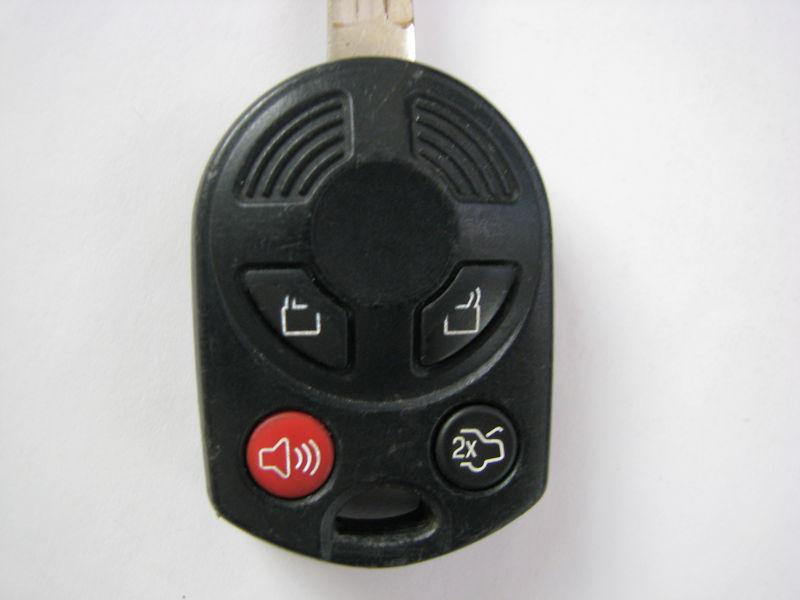 Ford fusion taurus key with keyless entry remote fcc: oucd6000022 6u5t-19h316-ad