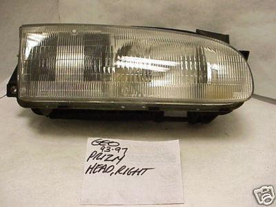 Geo prizm 93-97 1993-1997  headlight passenger rh right oe