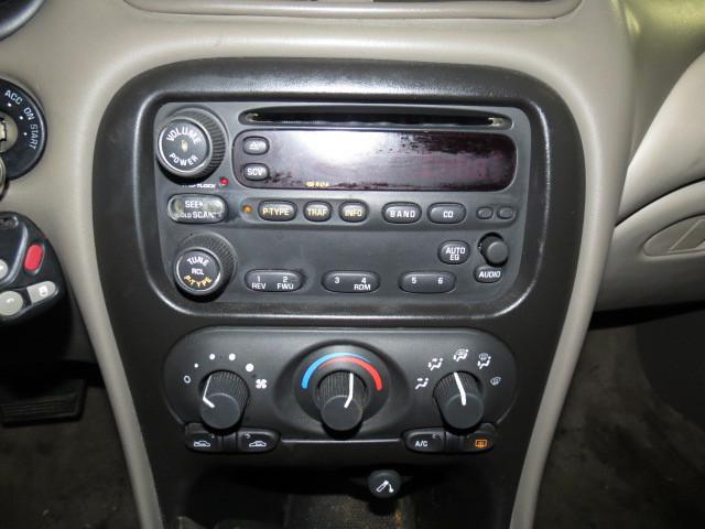 2003 oldsmobile alero radio trim dash bezel 2562399