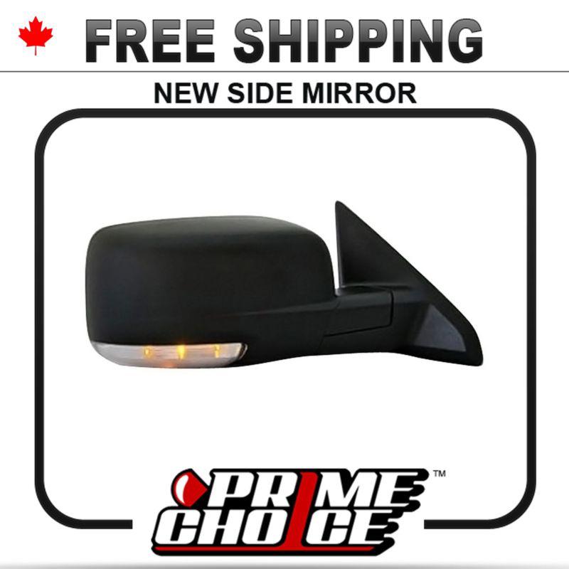 New power heated passengers side door mirror for a dodge ram