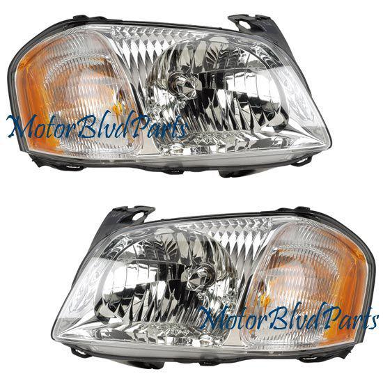 01-04 tribute headlights headlamps right+left oe style