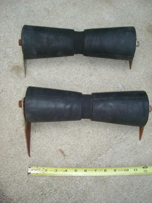 Set of heavy duty black rubber 12 inch keel rollers - used