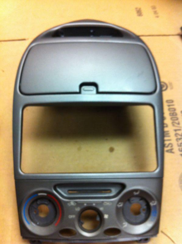 2000-2005 toyota celica radio console w/ clock and hvac faceplate