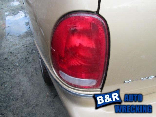 Left taillight for 96 97 98 99 00 caravan ~ 4903835