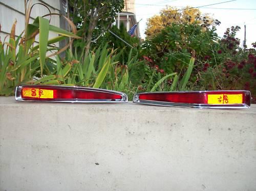 Both tail lights with bezels 1996 cadillac deville 