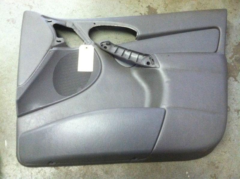 2000-2004 ford focus sedan front passenger side door panel (used) 