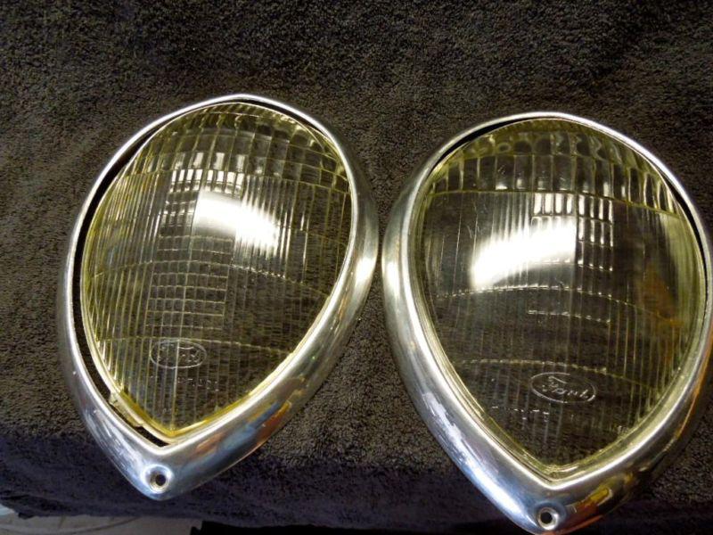 Nice pair of used 1937-1938-1939 ford headlight lenses and rims