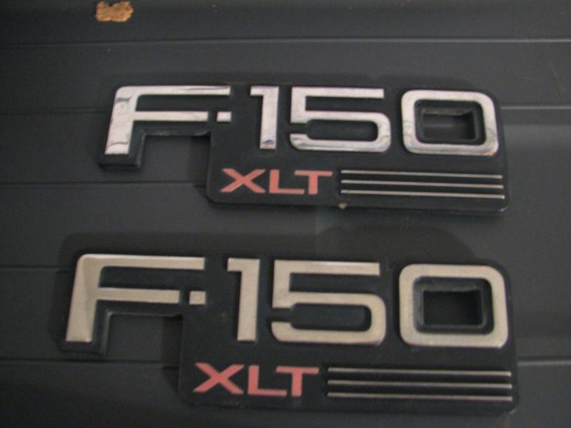 92-96 ford f-150 xlt  emblems set of 2