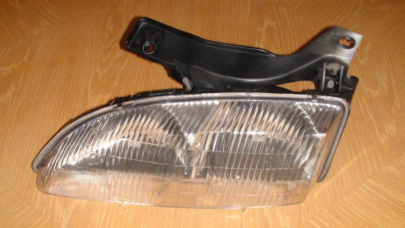 Oem headlight assembly ( left - driver side) for 95 -99 cavalier