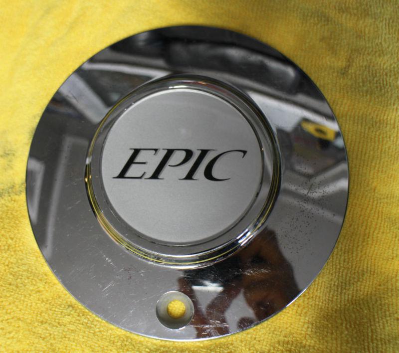 1 used epic wheel center cap. chrome w/silver logo center. p/n#991-0620