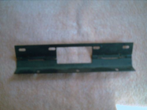 Liscense plate bracket hinged and spring loaded