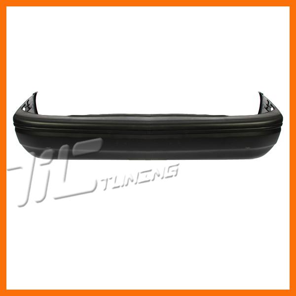 90-94 mazda protege rear bumper facial cover raw black base/dx 4dr sedan