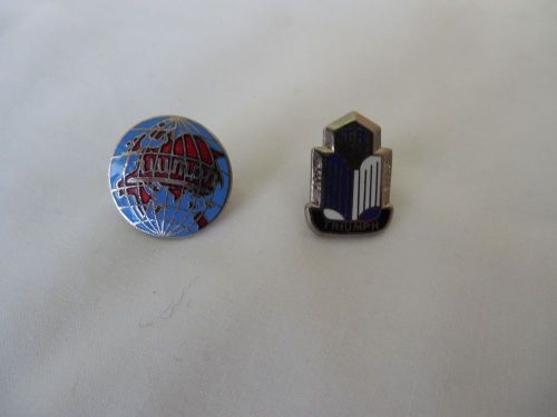 Two triumph lapel, tie tac pins