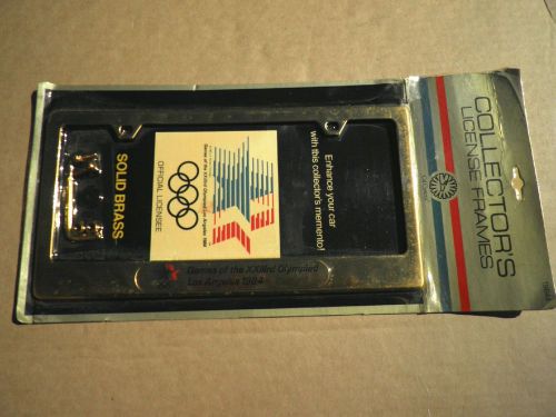 1984 los angeles olympics license plate frame - solid brass - nos - mint in pkg