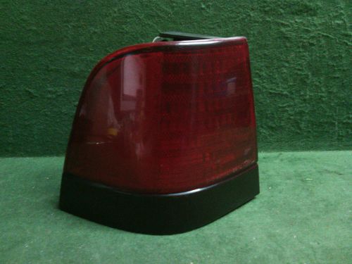 1989 - 1991 ford thunderbird  lh driver tail light with black trim  oem