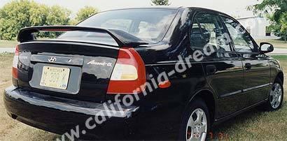 Painted custom style spoiler for a  hyundai accent 4 dr  2000-2002